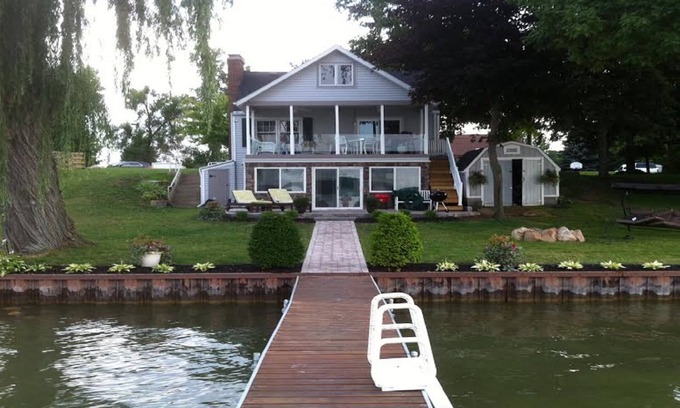 Manitou Beach-Devils Lake Cottage | Lakefront home- all amenities & beautiful view. Updated beds/carpet/furniture