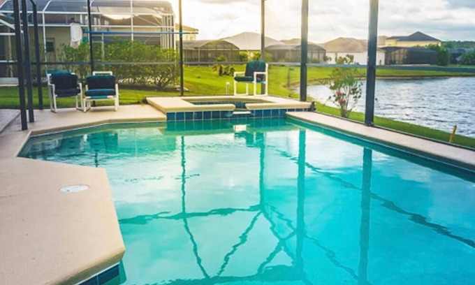 Crescent Lakes Villa | Lakefront Bliss: Private Pool & Spa – 25 Mins to Disney!