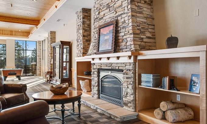 Three Lakes Cabin | Lakefront cabin with lake views, wood stove, hot tubs, heated pool, gym, golf