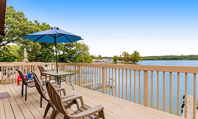Lake Delton Condo | Lakefront dog-friendly condo near skiing with private beach access, views & dock