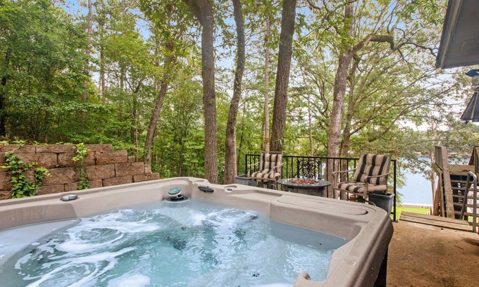 Mid America House | Lakefront dog-friendly home with lake views, dock, firepit, & grill area by lake