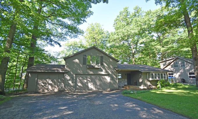 Empire Cottage | Lakefront home on Little Glen Lake with fireplace, deck, gas grill, and firepit