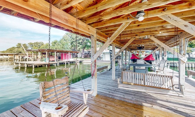 West Livingston House | Lakefront Home with Private Dock, Outdoor Kitchen & Kayaks - Dog-Friendly
