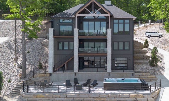 Sunrise Beach House | Lakefront Luxury 7 bed Home with Private Dock, Swim Spa on 13MM in Porto Cima