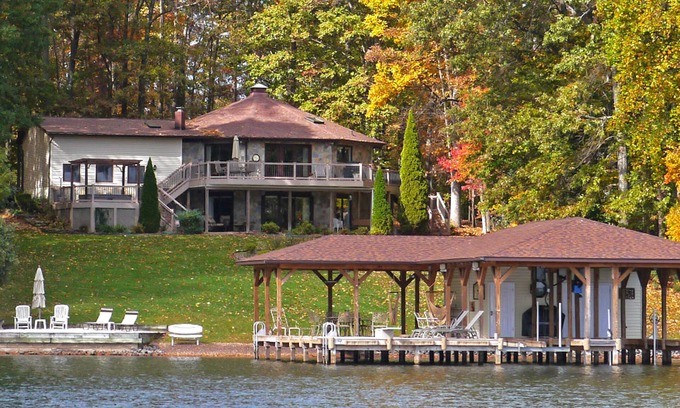 Bumpass House | Lakefront retreat with a dock, waterfront kitchenette, firepit & hot tub