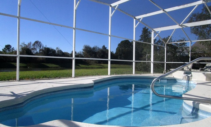 Windward Cay Villa | 'Lakeside Haven' Fantastic South Facing Pool, Spa and Stunning Lakeside Views.