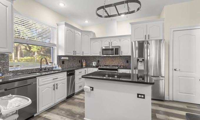 Port Richey House | Lakeview Poolside Retreat: Gated 3-Acre Paradise, Perfect for Events & Escaping!