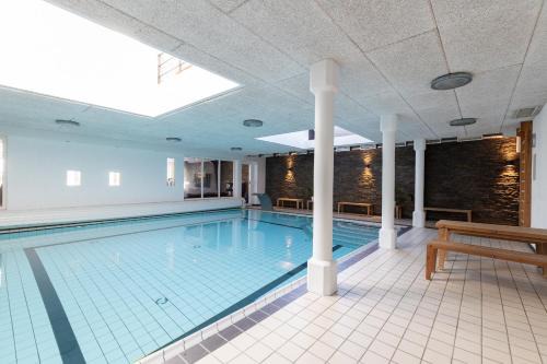Rudkobing House | Langeland luksuslejlighed med pool og spa