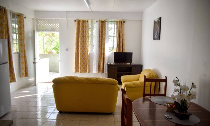 Castle Comfort Apartment | Large 2 Bedroom 2 Bathroom Apartment #4 in Roseau. Bus stops right in front!