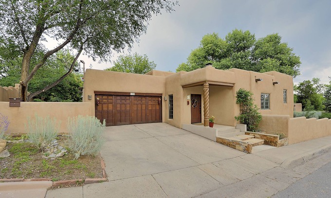 Historic Eastside House | Large Remodeled Home in Historic District, HOT TUB, 10 minute walk to Plaza!