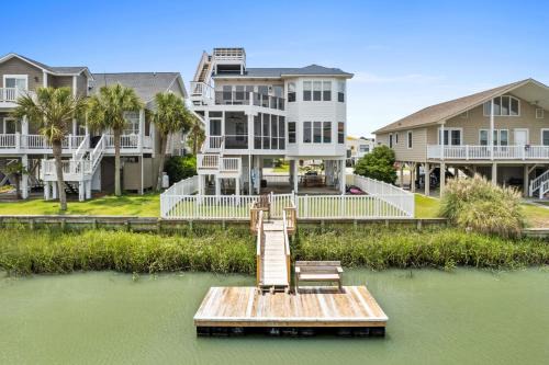 Ocean Isle Beach House | Latitude Adjustment by Brunswick Vacation Rentals Canal front with dock