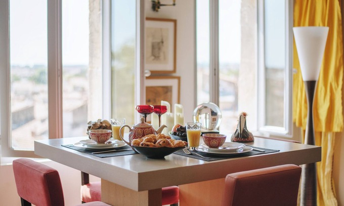 Montpellier City-Centre Apartment | Le Nid Exotique: views over the rooftops of the city center