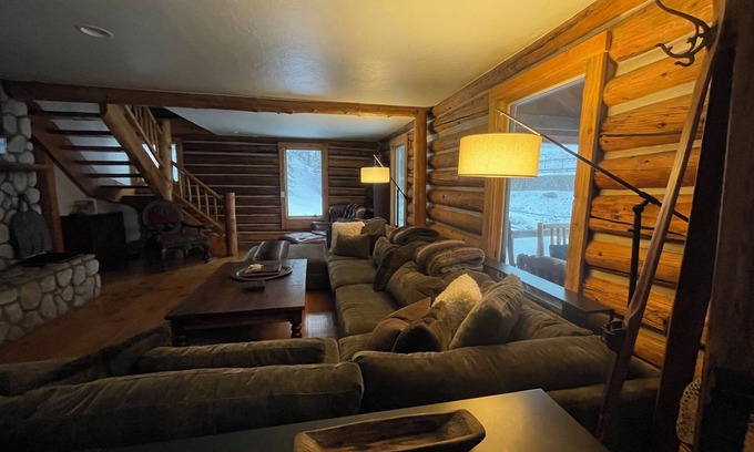 Highland Meadows Cabin | Lena's Cabin in Vail is nestled right beside Gore Creek, minutes from skiing.