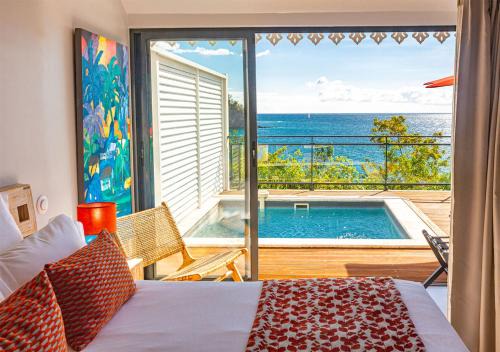 Bouillante Hotel | LES GALETS ROUGES LODGES & SPA