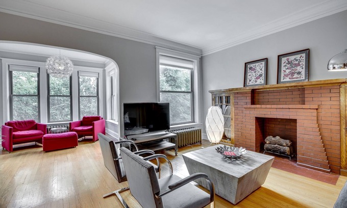 North Center Apartment | Light Filled with Tasteful Pops of Color - You Will Love This Mid-Century Modern Gem by AllSet Turnover