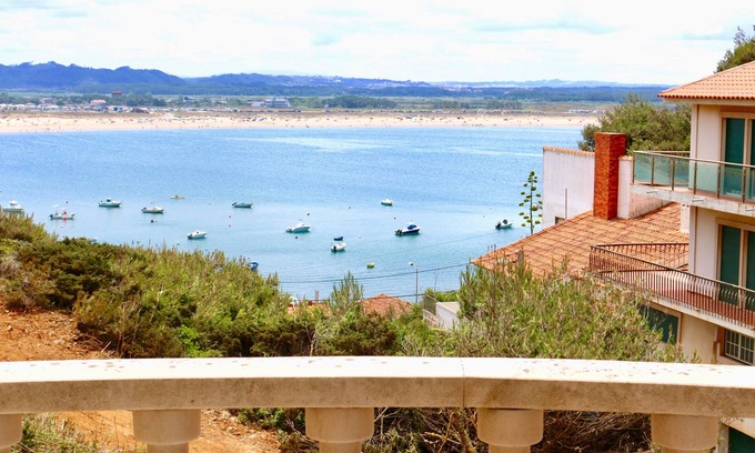 Sao Martinho do Porto House | Lighthouse - 3 story holiday home with shared tennis court and sea views