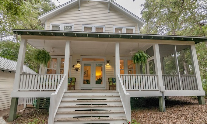 Bald Head Island Cottage | Live oak views from this 3 bedroom cottage; 2 golf carts and peaceful screened in porch