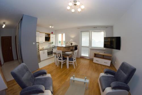 Lodz Apartment | Lodz4rent - Premium Apartments 9,6 - MONOPOLIS - Garaż podziemny - Wakacje 2025