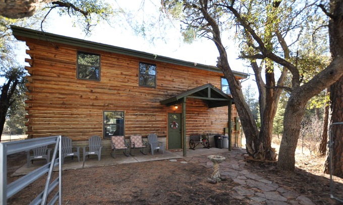 Young Cabin | Log cabin on 2.5 private wooded acres! Bring your horses & ATV's. Hunt area 23