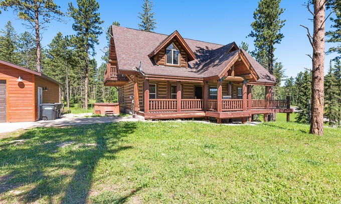 Lead House | Log cabin with private hot tub, fireplaces, decks & game room - near golf course