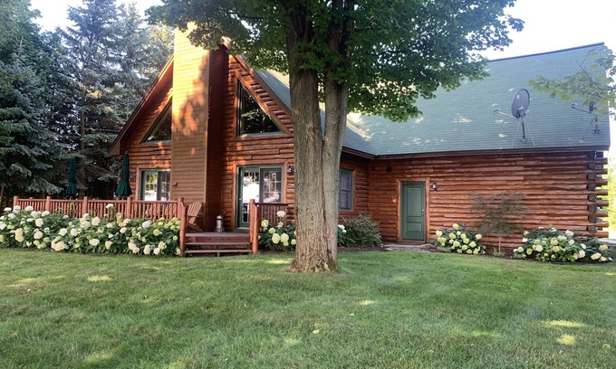 Kewadin House | Log home overlooking Torch Lake