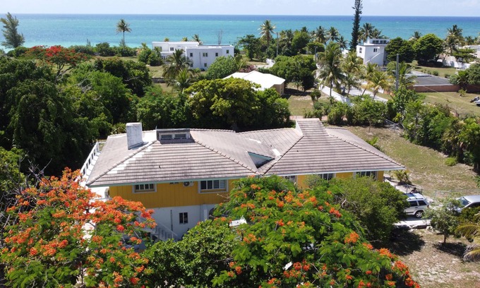Discovery Bay Apartment | Lovely 1 bedroom, steps from the beach, car available
