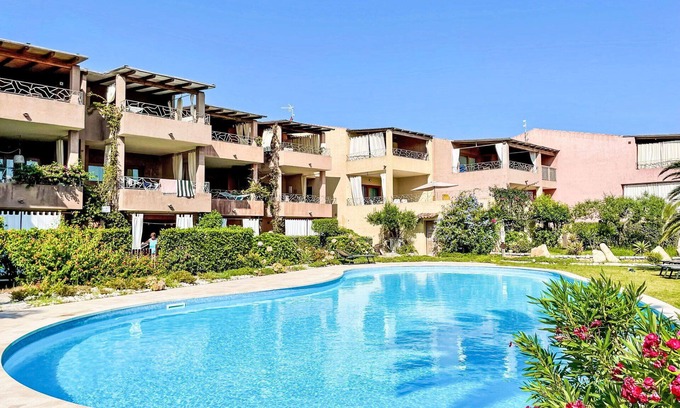 Porto Pozzo Apartment | Lovely apartment for 4 guests with A/C, pool, WIFI, terrace and pets allowed