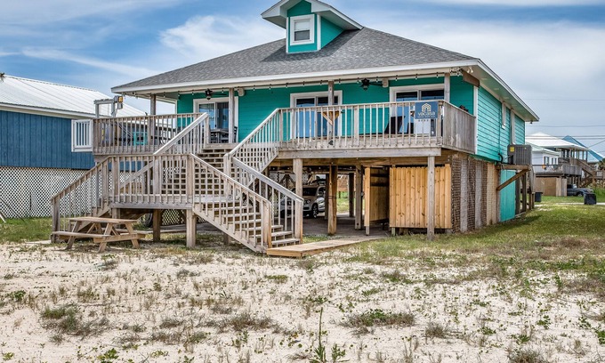 Silver Cay House | Lovely beachfront home with a private dock & spacious deck - dogs welcome