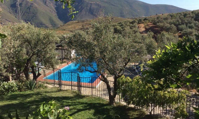 Orgiva House | Lovely farmhouse set in private olive groves with mountain views and gated pool