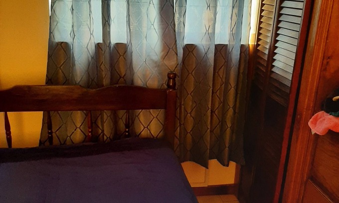 Roseau House | Lulu’s overnight home with beautiful mountain and sea view.