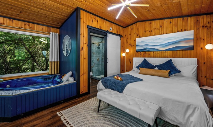 Sevierville Cabin | Lux Couples Getaway! Private Theatre! Hot tub! Fire-pit! SEASONAL SPECIALS!