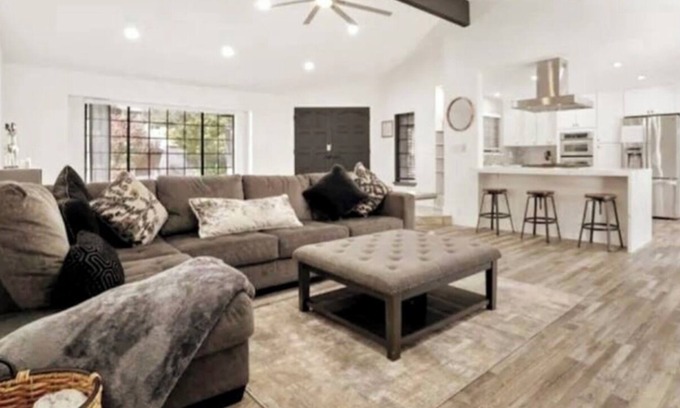 Modesto House | Lux Home wall-to-wall shower with nine heads ensuring a luxurious experience.