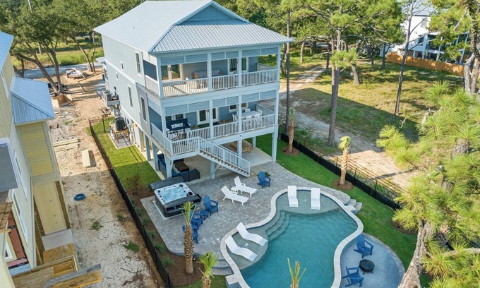 Gulf Shores House | Lux Waterfront Home, Free Heated Pool, Hot Tub&Fire Pit, Pier/Boat Dock, Views!