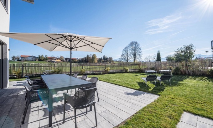 Gstadt House | Luxurious design holiday home with mountain view, fireplace and garden