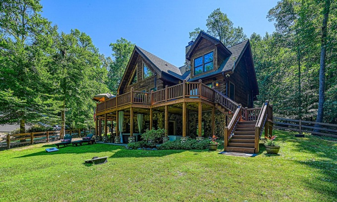 Bumpass Cabin | Luxurious lakefront cabin with hot tub, game room, & washer/dryer- dog friendly