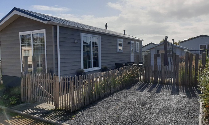 Renesse Ski Chalet | Luxury 4pers chalet, only 318 STEPS TO THE BEACH, fully enclosed garden.