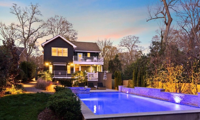 Commonwealth Park House | Luxury Charlotte Home with Stunning Pool & Hot Tub & Waterfalls