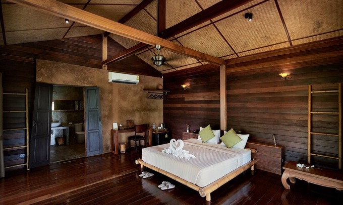 Nang Lae Villa | Luxury loft in stilted wooden longhouse