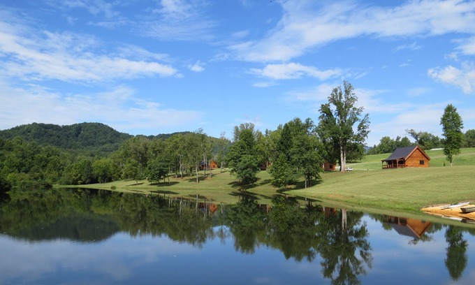 Nellysford Cabin | Luxury Log cabin on private lake. Pet Friendly!