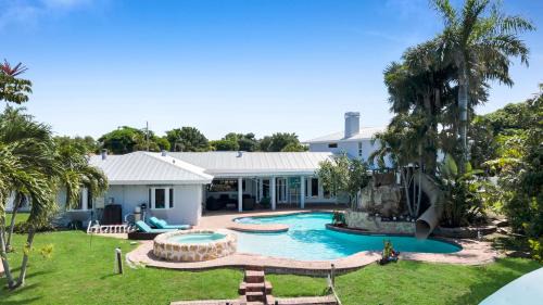 McGregor Villa | Luxury Waterfront-Pool Home, Slide, Hot Tub, Gulf Access