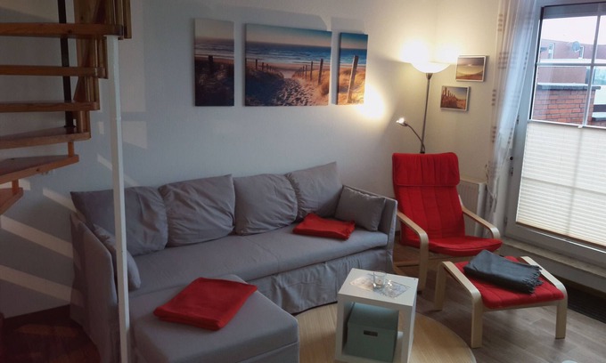 Dornum Apartment | Maisonette apartment - 17m² balcony - Garage for bicycles - Free WLAN -