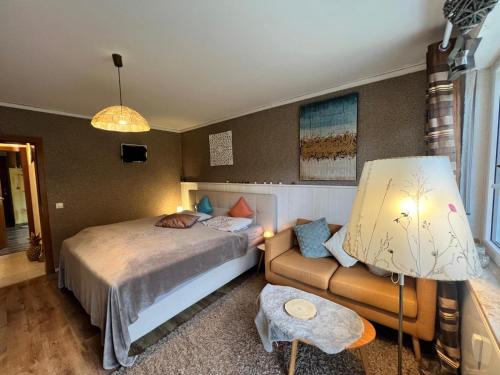 Marburg Apartment | Marburg Apartment pfiffige Luisa in ruhiger Waldrandlage mit Balkon und Wintergarten