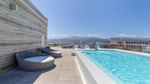 Isla Iguana Apartment | Marina Nautico 9 Luxury & Great Rooftop Pool View by Kivoya