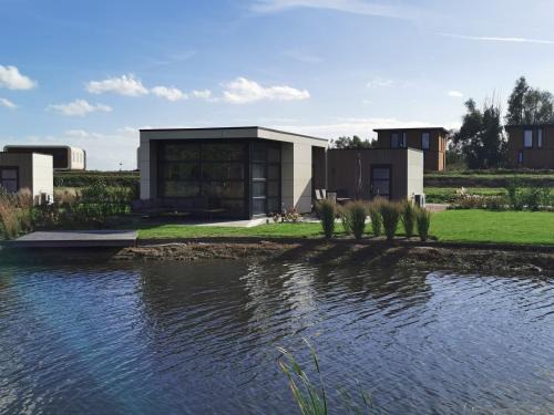 Olburgen House | Marina Strandbad Chalet Aan het Oever mit Zaun Haus Nr 135