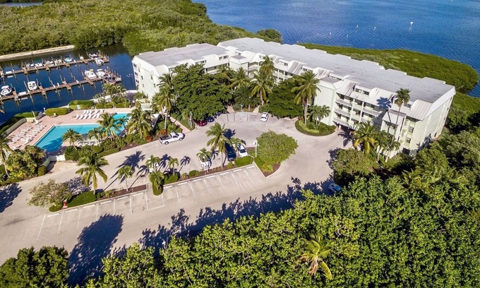 Captiva House | Marina views, heated pool, hot tub, short walk to the beach
