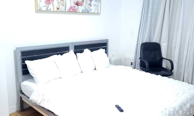 West Side Apartment | Master bedroom with bathroom. With Fridge, Mircowave . 50 Inch LCD, etc.