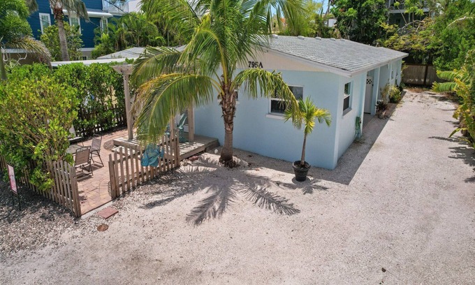 Anna Maria House | McBean Point: Dog Friendly! Walk to Bean Point! by Anna Maria Life Vacation Rentals