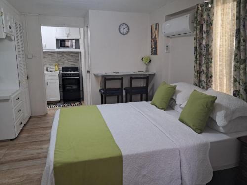 Charnocks Apartment | Michand Guest Apartments- Cozy one or two bedroom- 5 walk minutes from airport 10 mins drive to Oistins or beach