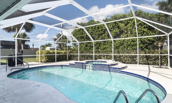 Bonita Springs House | Mid Century Home with Heated Pool + Spa