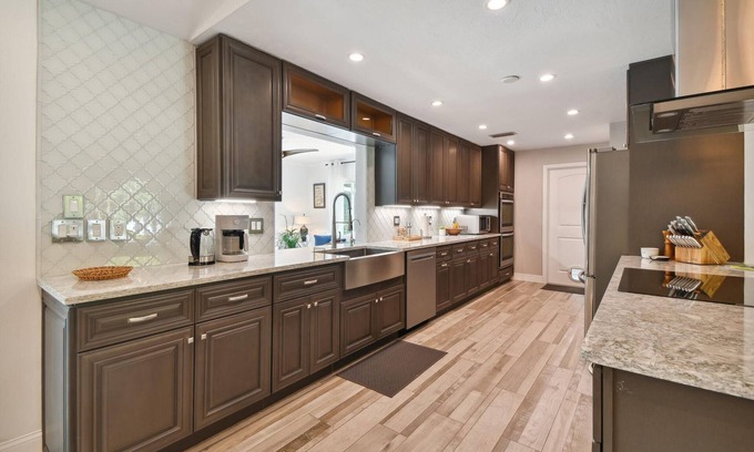 Desoto Lakes House | Mid-Century Modern pool home 3 Bed, 2 Bath home, walkways in the private garden
